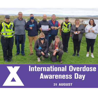 Group photo from Flower Walk marking Overdose Awareness Day